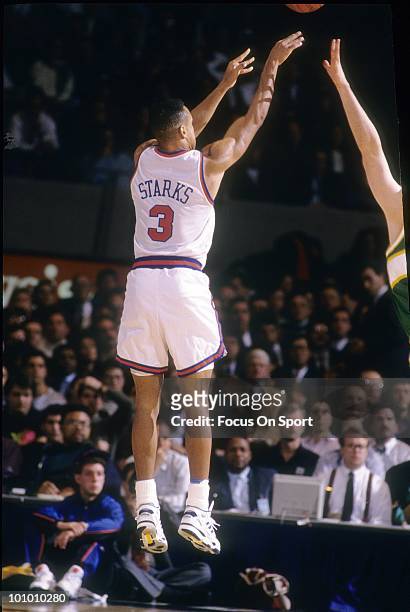 S: Guard John Starks of the New York Knicks in action shoots over a Seattle Super Sonics defender circa early 1990's during an NBA basketball game at...