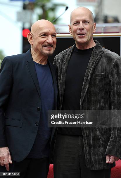 Actor Bruce Willis poses with actor Sir Ben Kingsley who was honored with the 2,410th Star on the Hollywood Walk of Fame on May 27, 2010 in...