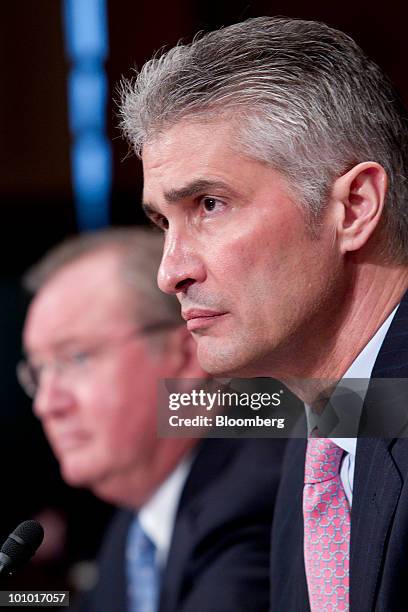 Jeffery Smisek, chairman, president and chief executive officer of Continental Airlines Inc., right, and Glenn Tilton, chairman, president and chief...