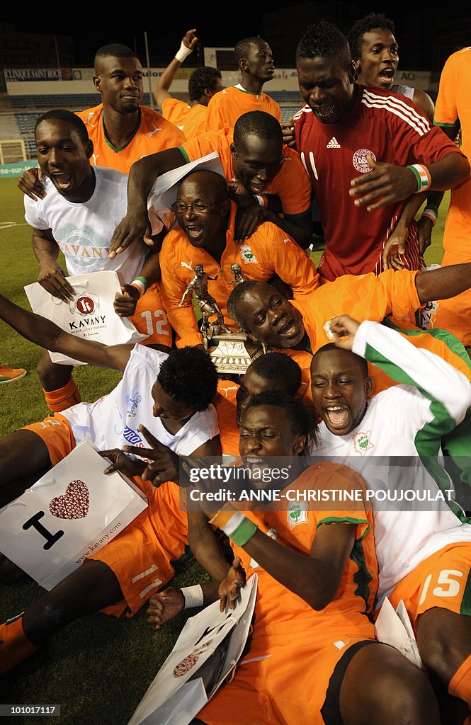 Ivory Coast players celebrate with their