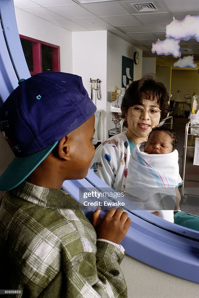 BLACK BOY WITH HAT AT NURSERY