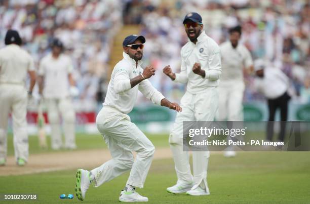 India's Shikhar Dhawan celebrates taking catch off England batsman Jonny Bairstow during of day three of the Specsavers First Test match at...