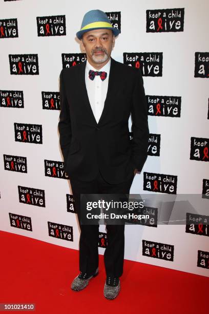 Christian Louboutin arrives at the Keep A Child Alive Black Ball held at St John's, Smith Square on May 27, 2010 in London, England.