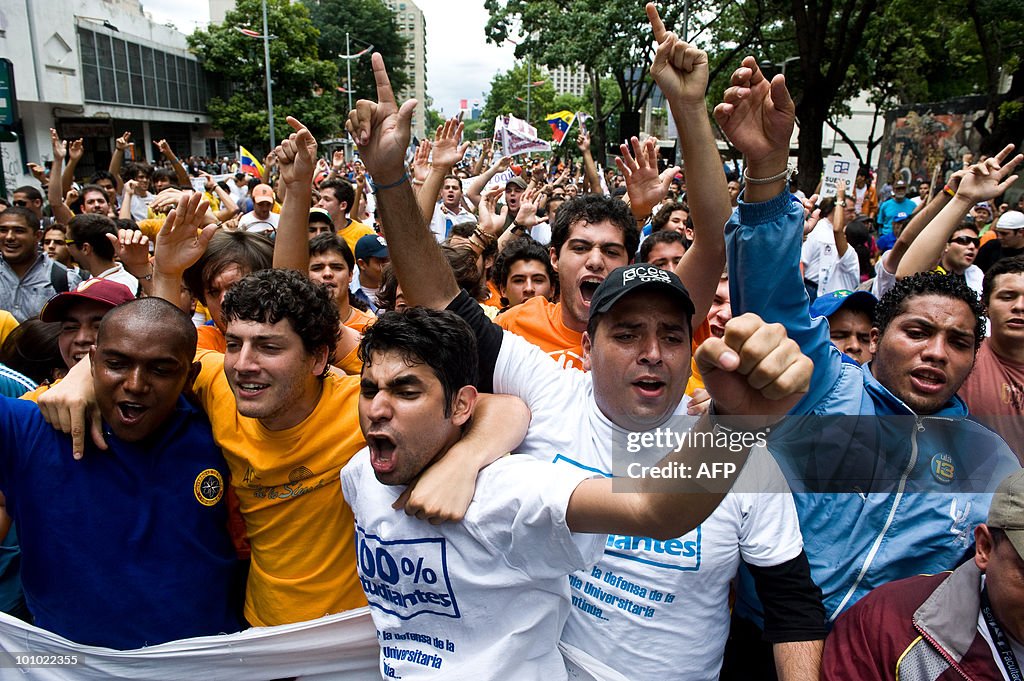 Students shout slogans during a protest