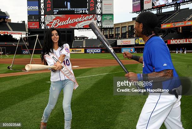 Miss USA Rima Fakih and Jose Reyes of the New York Mets visit Citi Field on May 27, 2010 in the Flushing neighborhood of the Queens borough of New...