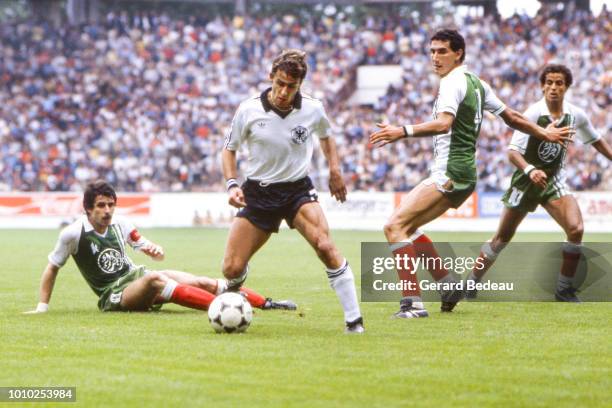 Pierre Littbarski of Germany FR, Nordine Kourichi of Algeria during the World Cup match between Germany RF and Algeria at El Molinon, Gijon, Spain on...