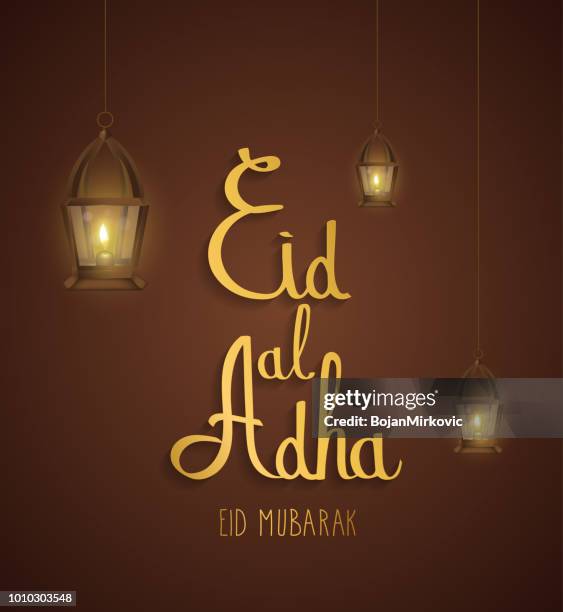 stockillustraties, clipart, cartoons en iconen met eid al adha gouden hand belettering. eid mubarak. moslim kerstkaart met lantaarn. vectorillustratie. - eid mubarak