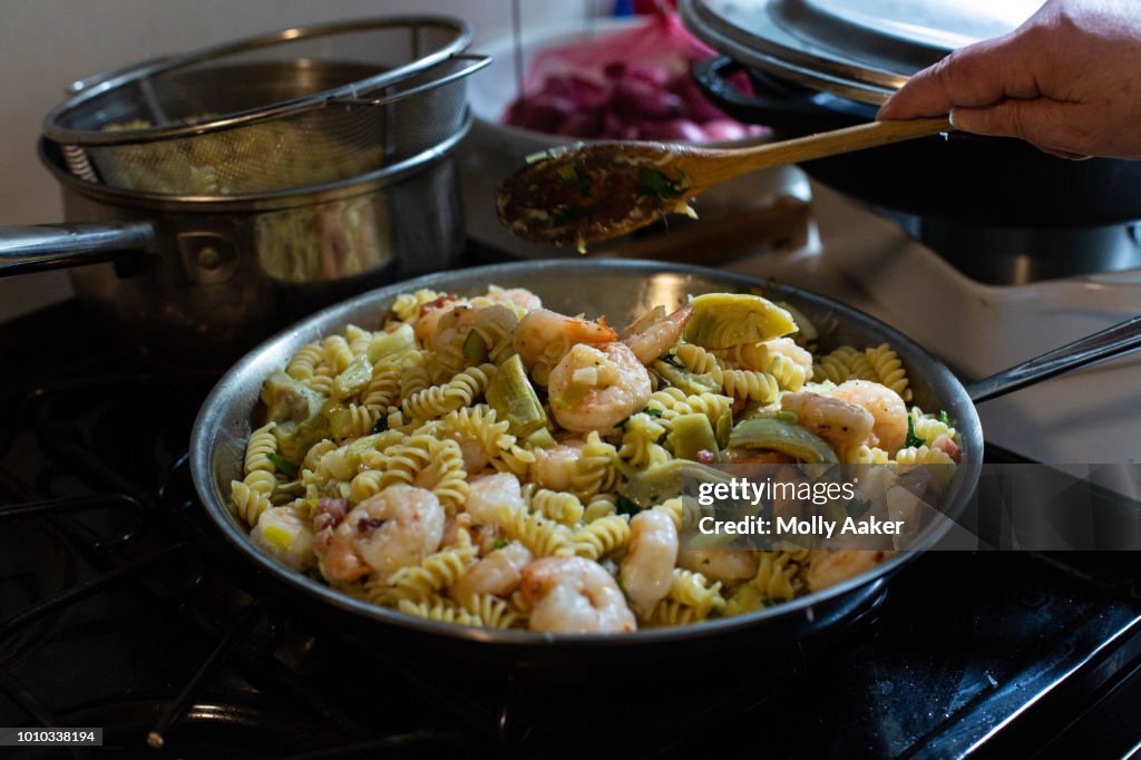 Devu Cook Cooking Pasta High-Res Stock Photo - Getty Images
