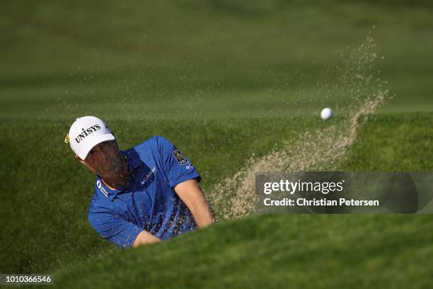 Ryan Palmer chips from the bunker onto the eighth green during the second round of the Barracuda Championship at Montreaux Country Club on August 3,...