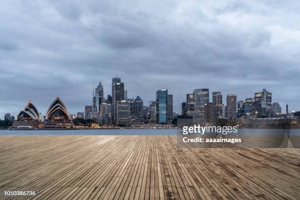 dusk view of sydney downtown skyline,australia - sydney opera house stockfoto's en -beelden