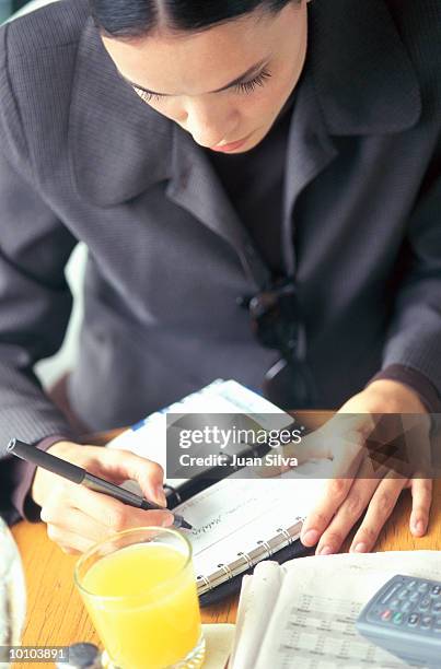 Woman Writecheck 114 Writing A Check Checkbook Stock Photos, High-Res Pictures, and ...