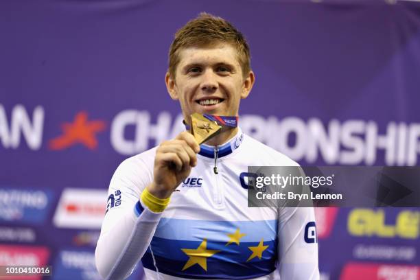 Roman Gladysh of Ukraine celebrates winning gold in the Mens 15km Scratch Race during the track cycling on Day Two of the European Championships...