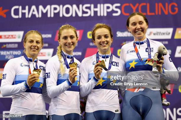 The Great Britain team Neah Evans, Laura Kenny, Elinor Barker and Katie Archibald celebrate winning the gold medal in the Womens Team Pursuit during...