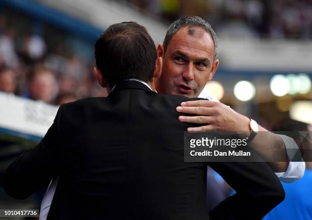 Paul Clement, Manager of Reading greets Frank Lampard, Manager of Derby County prior to the Sky Bet Championship match between Reading and Derby...