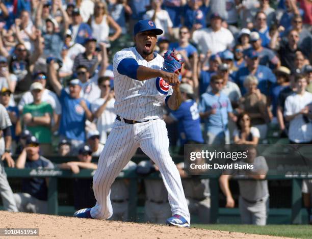 Pedro Strop of the Chicago Cubs reacts after getting the final out against the San Diego Padres during the ninth inning on August 3, 2018 at Wrigley...