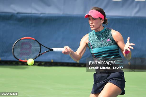 Andrea Petkovic of Germany returns a forehand shot to Belinda Bencic Switzerland during Day Seven of the Citi Open at the Rock Creek Tennis Center on...