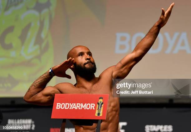 Demetrious Johnson poses on the scale during the UFC 227 weigh-in inside the Orpheum Theater on August 3, 2018 in Los Angeles, California.