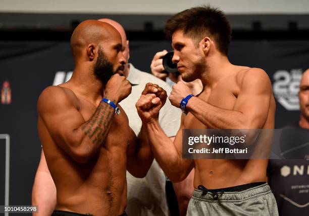 Opponents Demetrious Johnson and Henry Cejudo face off during the UFC 227 weigh-in inside the Orpheum Theater on August 3, 2018 in Los Angeles,...