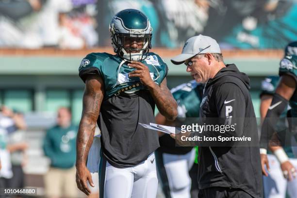 Philadelphia Eagles wide receiver Mike Wallace gets instructions from wide receivers coach Gunter Brewer during Eagles Training Camp on August 2 at...