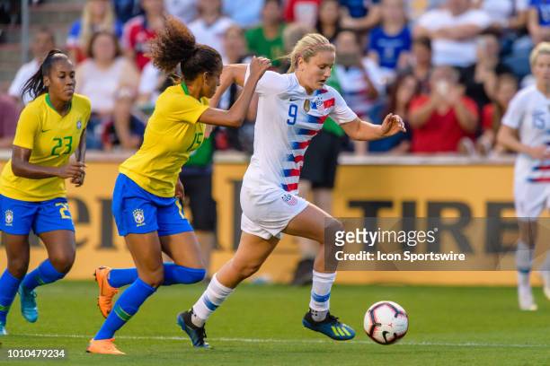 Womens National Team midfielder Lindsey Horan attacks as Brazil Womens National Team defender Tayla defends in the 1st half during a Tournament of...