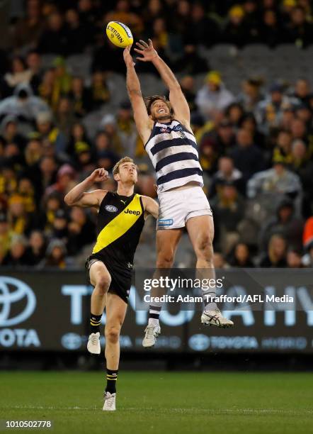 Tom Hawkins of the Cats and David Astbury of the Tigers compete for the ball during the 2018 AFL round 20 match between the Richmond Tigers and the...