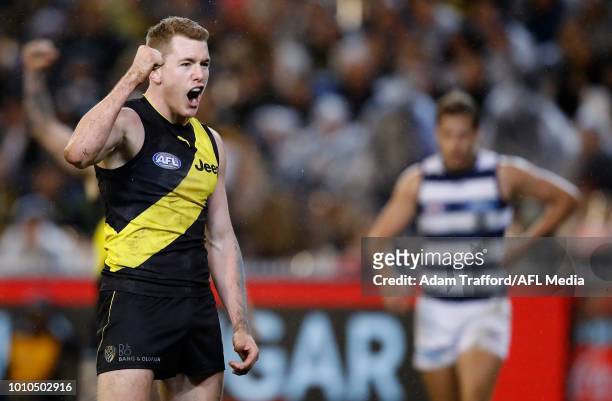 Jacob Townsend of the Tigers celebrates a goal during the 2018 AFL round 20 match between the Richmond Tigers and the Geelong Cats at the Melbourne...