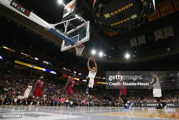 Ryan Hollins of Killer 3s drives to the basket against Tri State during week seven of the BIG3 three on three basketball league at TD Garden on...