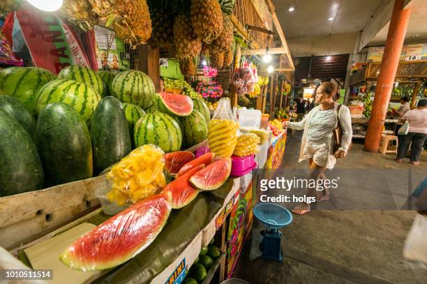 negros oriental dumaguete area by day fruit makets and people buying - negros_(philippines) stock pictures, royalty-free photos & images