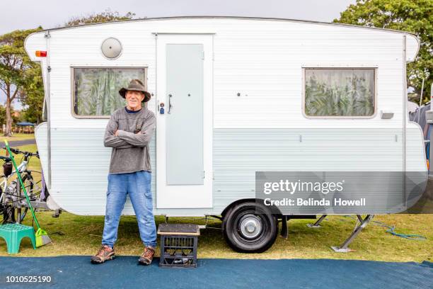 grandparents with grandkids at campground with their caravan - portrait of a camper stock pictures, royalty-free photos & images