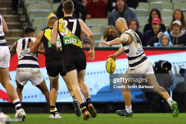 Gary Ablett of the Cats kicks and missses a shot at goal in the final minutes during the round 20 AFL match between the Richmond Tigers and the...