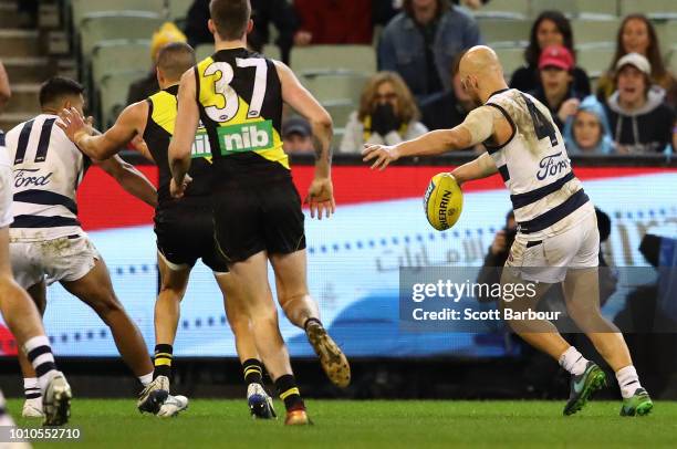 Gary Ablett of the Cats kicks and missses a shot at goal in the final minutes during the round 20 AFL match between the Richmond Tigers and the...