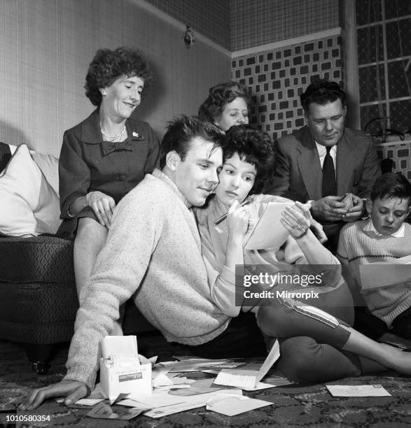 Rock 'n' Roll singer Marty Wilde and his fiance Joyce Baker making last minute arrangements at the home of Marty's parents in Greenwich, ahead of...