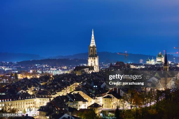 bern cityscape at night, switzerland - bern clock tower stock pictures, royalty-free photos & images