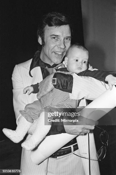 Marty Wilde and his baby daughter Roxanne, 5th March 1980.