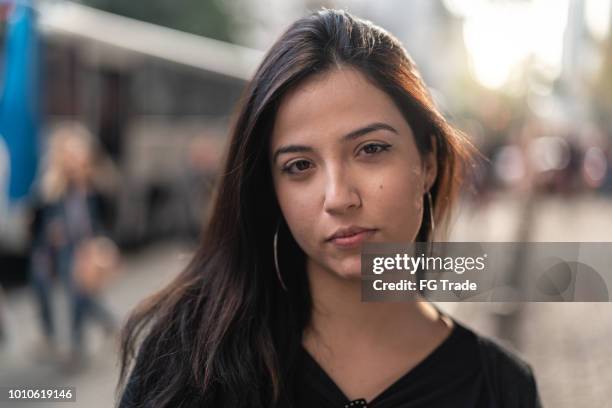 portrait of a young woman in the city - no smile stock pictures, royalty-free photos & images