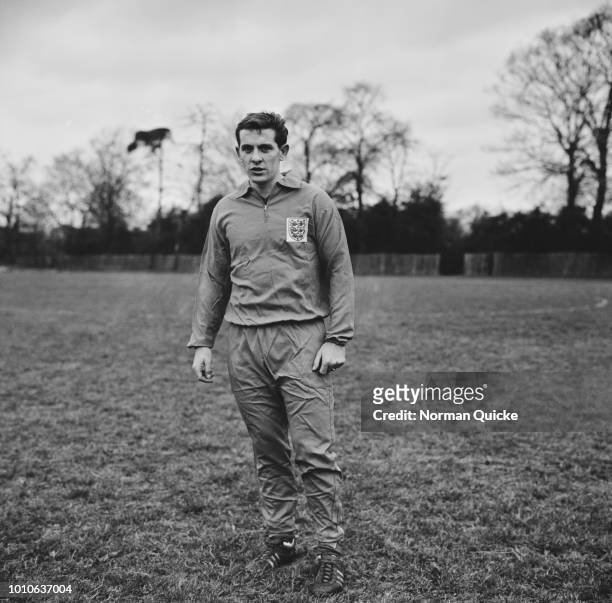 English professional footballer and midfielder with Tottenham Hotspur FC, Alan Mullery pictured during a training session with the England national...