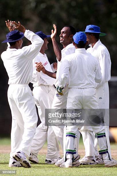 Mario Villavayan of the Board XI celebrates after dismissing Justin Langer of Australia, during day two of the tour match between the Sri Lanka Board...