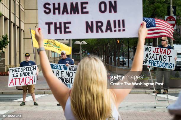 Pro NRA activists take up positions in the median of Pennsylvania Ave. In a counter protest as activists, in response to what they perceive as the...