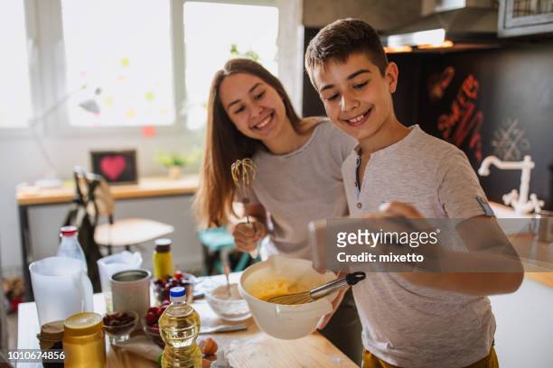 selfie in the kitchen - making pancakes stock pictures, royalty-free photos & images