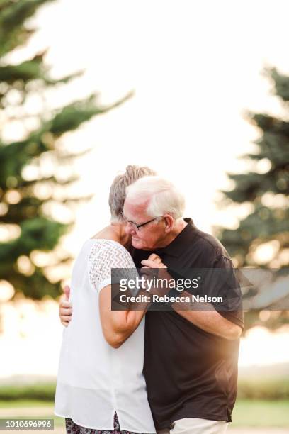 senior man and woman dancing - slow dancing stock pictures, royalty-free photos & images