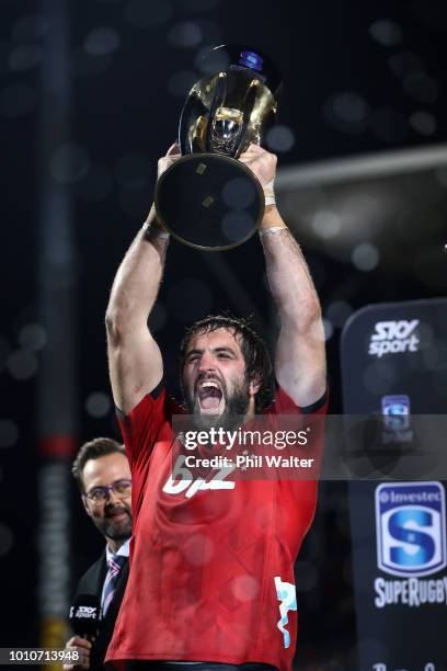 Crusaders captain Sam Whitelock celebrates with the trophy following the Super Rugby Final match between the Crusaders and the Lions at AMI Stadium...