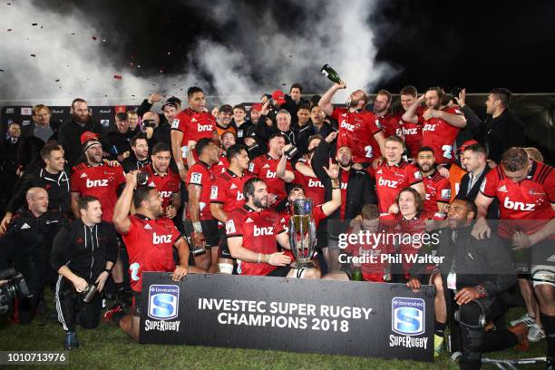 The Crusaders celebrate with the trophy following the Super Rugby Final match between the Crusaders and the Lions at AMI Stadium on August 4, 2018 in...