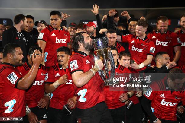 Crusaders captain Sam Whitelock celebrates with the trophy following the Super Rugby Final match between the Crusaders and the Lions at AMI Stadium...