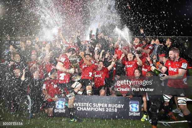 The Crusaders celebrate with the trophy following the Super Rugby Final match between the Crusaders and the Lions at AMI Stadium on August 4, 2018 in...