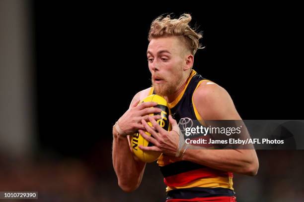 Hugh Greenwood of the Crows marks the ball during the 2018 AFL round 20 match between the Adelaide Crows and the Port Adelaide Power at the Adelaide...