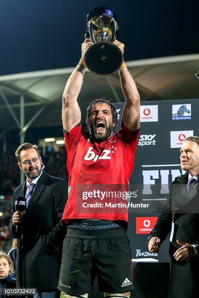 Crusaders captain Sam Whitelock celebrates with the Super Rugby Trophy after the Super Rugby Final match between the Crusaders and the Lions at AMI...