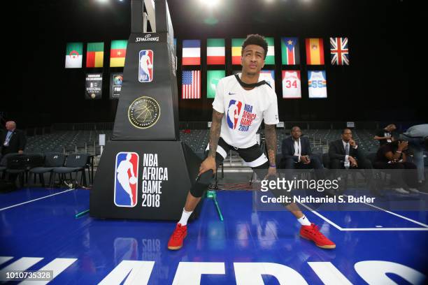 John Collins of Team World stretches during practice prior to the NBA Africa Game 2018 as part of the Basketball Without Boarders Africa program on...