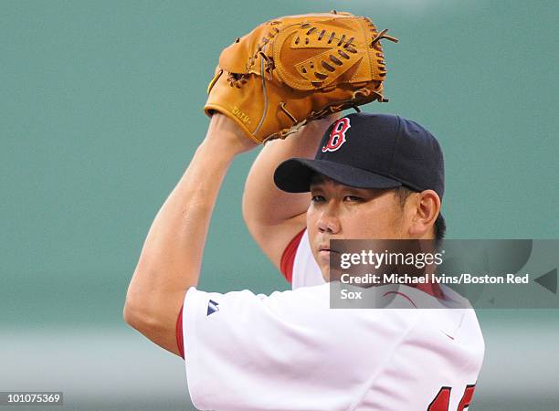 Daisuke Matsuzaka of the Boston Red Sox pitches against the Kansas City Royals in the first inning on May 27, 2010 at Fenway Park in Boston,...