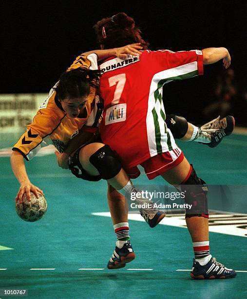 Lydia Kahmke of Australia is tackeled by Beata Megyebirone of Hungary during the match between Australia v Hungary at the Southern Cross...