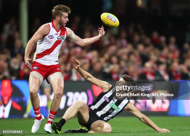 Sam McLarty of the Magpies competes for the ball against Alex Johnson of the Swans during the round 20 AFL match between the Sydney Swans and the...